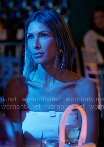 Erin’s white buckle strapless top on The Real Housewives of New York City Erin’s white buckle strapless top on The Real Housewives of New York City