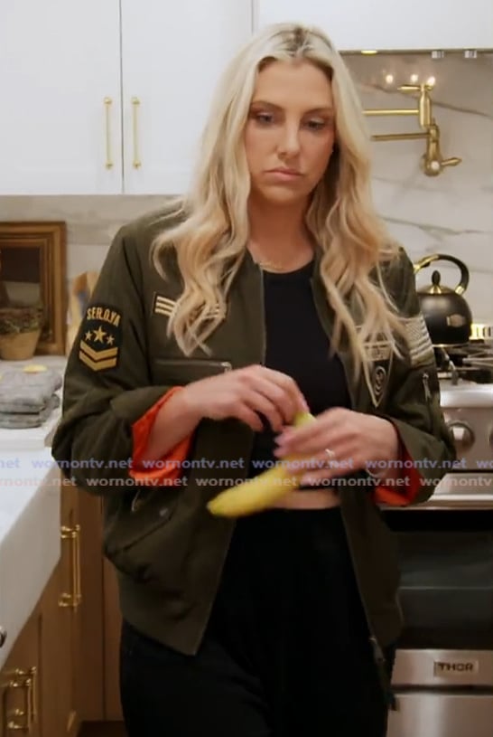 Gina’s green patch bomber jacket on The Real Housewives of Orange County Gina’s green patch bomber jacket on The Real Housewives of Orange County