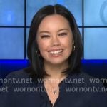 Jo Ling Kent’s navy scalloped trim top on CBS Mornings Jo Ling Kent’s navy scalloped trim top on CBS Mornings