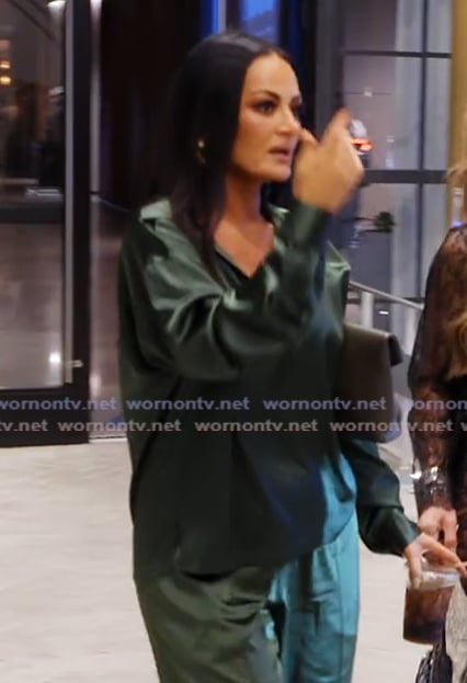 Lisa's green satin blouse and pants on The Real Housewives Ultimate Girls Trip