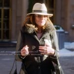 Luann's black mixed media coat on The Real Housewives Ultimate Girls Trip Luann's black mixed media coat on The Real Housewives Ultimate Girls Trip