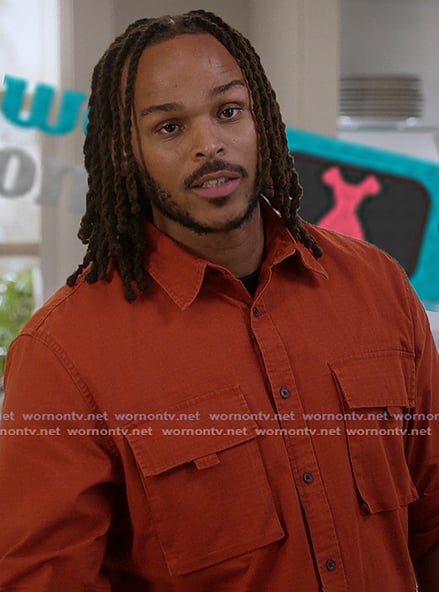 Marqui’s orange button down shirt on All American