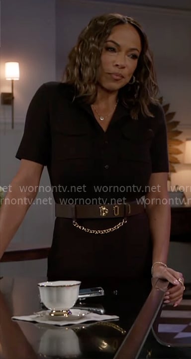 Nicole’s black short-sleeve dress and chain detail belt on Beyond the Gates