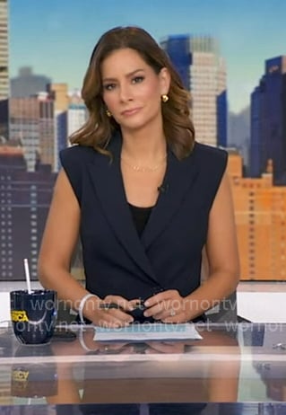 Rebecca's navy vest and flare pants on Good Morning America