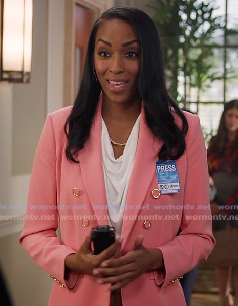 Reporter’s pink double breasted blazer on All American Reporter’s pink double breasted blazer on All American