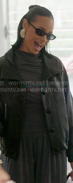 Sai's blue gathered top and black leather jacket on The Real Housewives of New York City