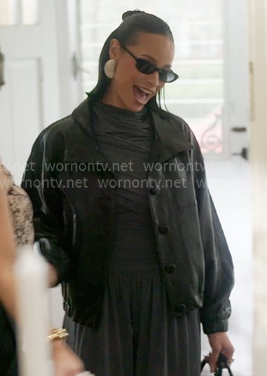 Sai's blue gathered top and black leather jacket on The Real Housewives of New York City
