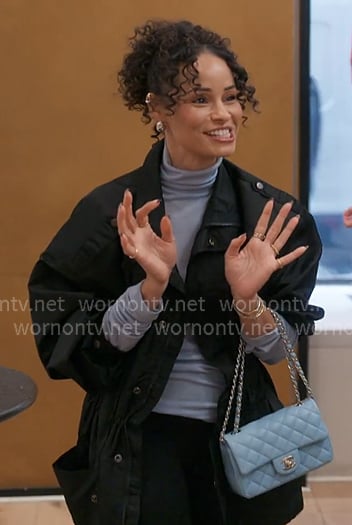 Sai’s light blue sheer turtleneck on The Real Housewives of New York City Sai’s light blue sheer turtleneck on The Real Housewives of New York City
