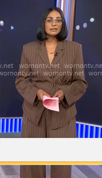 Shanelle Kaul’s brown pinstripe jacket and pants set on CBS Mornings Shanelle Kaul’s brown pinstripe jacket and pants set on CBS Mornings