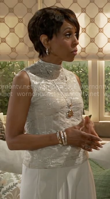 Sharon’s metallic top on Beyond the Gates