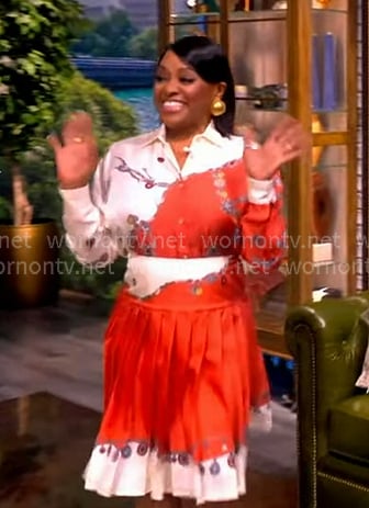 Sherri Shepherd's white and red print blouse and pleated skirt on The View