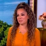 Sunny’s orange knit cardigan on The View Sunny’s orange knit cardigan on The View