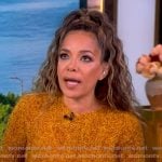 Sunny’s orange textured knit peplum sweater on The View