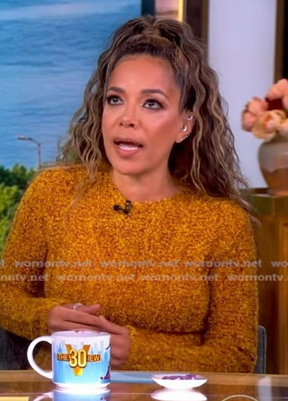 Sunny’s orange textured knit peplum sweater on The View Sunny’s orange textured knit peplum sweater on The View