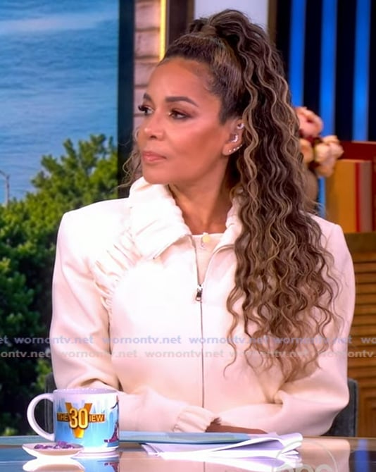 Sunny’s white ruffled jacket on The View