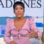 Tamron’s pink ruffled polka dot dress on Tamron Hall Show