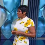 Tamron's white and yellow floral ruched dress on Tamron Hall Show