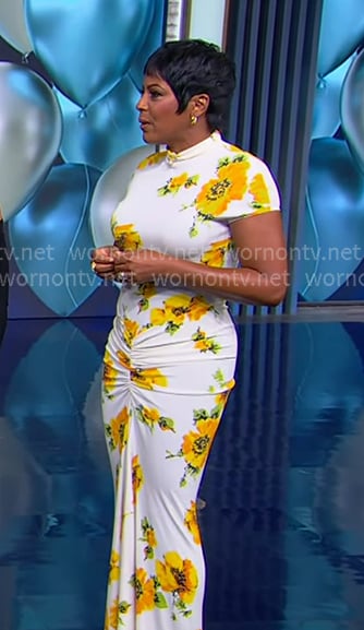 Tamron’s white and yellow floral ruched dress on Tamron Hall Show