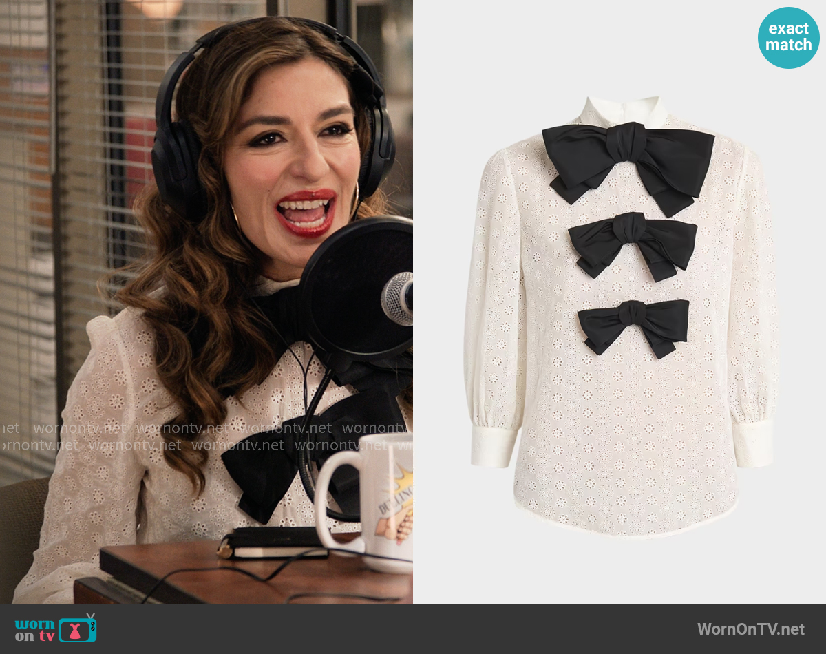 Valentino Garavani Bow Eyelet Mock-Neck Top worn by Esmeralda Grand (Sabrina Impacciatore) on The Paper Valentino Garavani Bow Eyelet Mock-Neck Top worn by Esmeralda Grand (Sabrina Impacciatore) on The Paper