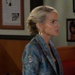 Vanessa's blue blazer with chain print on Beyond the Gates