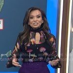 Adelle’s black mushroom print blouse and purple belted pants on Today
