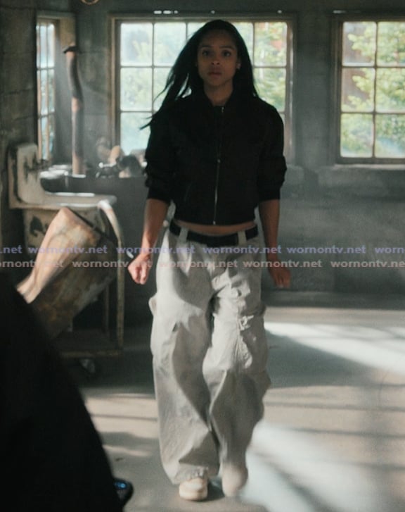 Andrea's black bomber jacket and cargo pants on Marshals