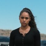 Andrea’s black henley top and grey pants on Marshals