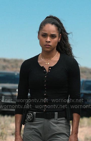 Andrea’s black henley top and grey pants on Marshals Andrea’s black henley top and grey pants on Marshals