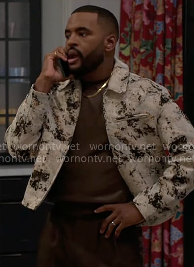 Andre's abstract print jacket on Beyond the Gates