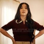Ashley’s burgundy polo top with crochet trim and striped pants on Nobody Wants This Ashley’s burgundy polo top with crochet trim and striped pants on Nobody Wants This