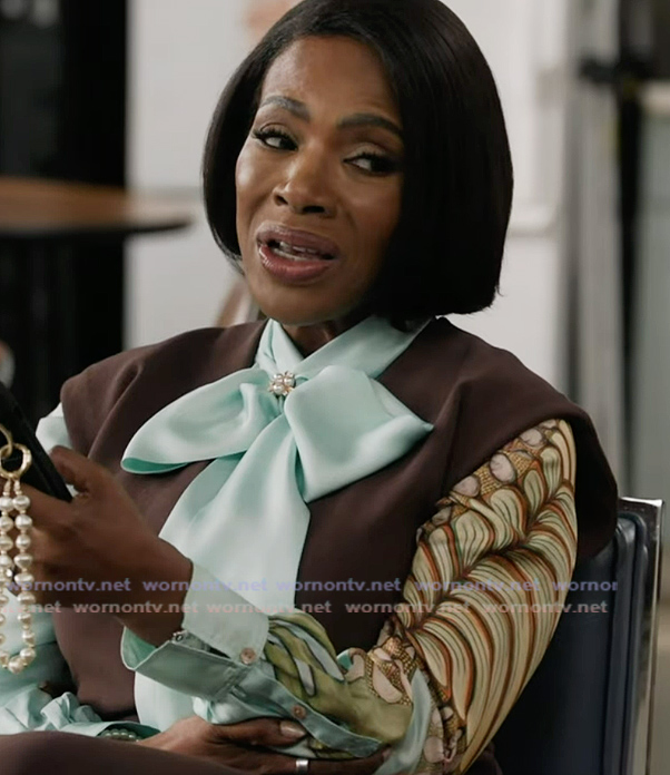 Barbara's blue printed tie neck blouse on Abbott Elementary