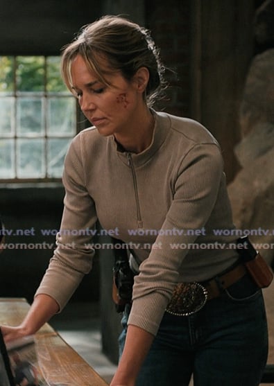 Belle’s beige half zip top on Marshals Belle’s beige half zip top on Marshals