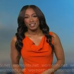 Brittany’s orange cowl neck dress on Good Morning America