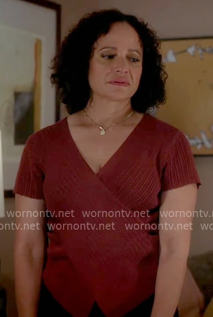 Carla’s red cross front knit top on Scrubs Carla’s red cross front knit top on Scrubs