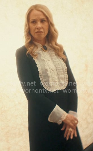 Coco's black dress with white ruffle front on American Horror Story