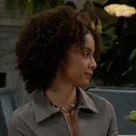 Deanna’s taupe pinstripe top on Beyond the Gates