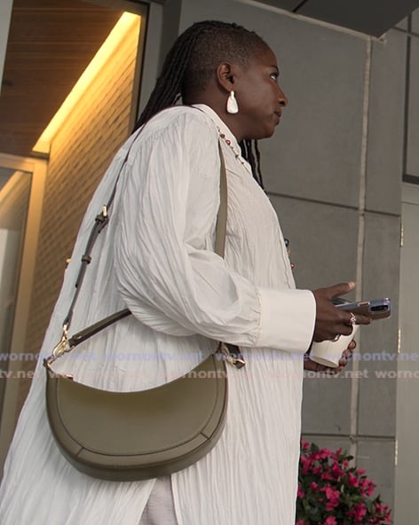 Desiree's white crinkle blouse on Reasonable Doubt