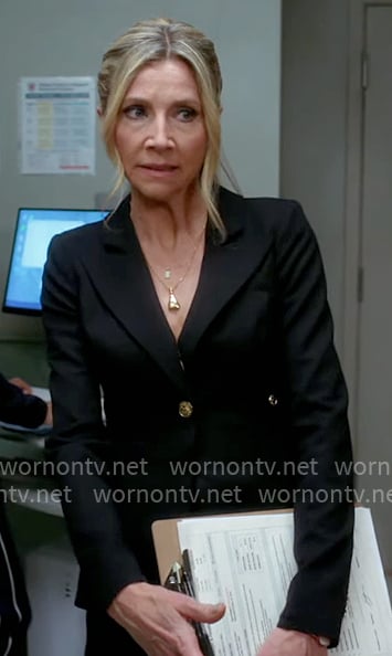 Elliot’s black blazer with gold button on Scrubs