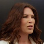 Emily’s white embellished coat on The Real Housewives of Orange County Emily’s white embellished coat on The Real Housewives of Orange County