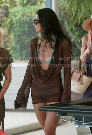 Erika's blue bikini set and brown sunglasses on The Real Housewives of New York City