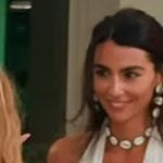 Erika's white plunging neckline maxi dress on The Real Housewives of New York City