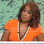 Gayle King’s orange v-neck dress with black trim on CBS This Morning