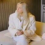Gina's white jacket and hoodie on The Real Housewives of Orange County