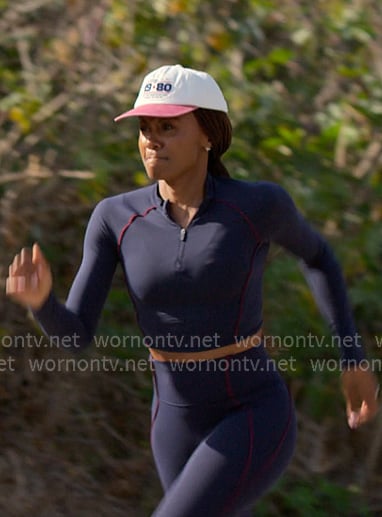 Jax's navy half-zip cropped top and leggings on Reasonable Doubt