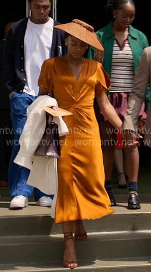 Jax's orange ruched v-neck satin dress on Reasonable Doubt