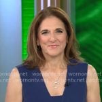 Jill Schlesinger’s navy v-neck dress on CBS Mornings Jill Schlesinger’s navy v-neck dress on CBS Mornings
