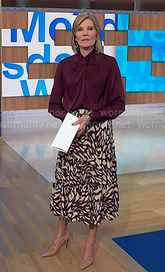 Kate's burgundy blouse and abstract print skirt on NBC News Daily