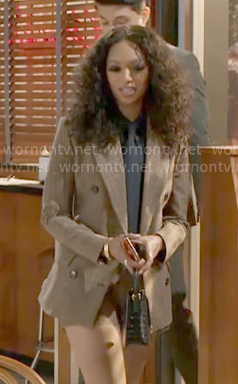 Kat’s brown plaid blazer and shorts on Beyond the Gates Kat’s brown plaid blazer and shorts on Beyond the Gates