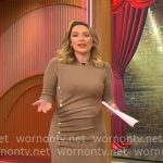 Kelly O’Grady’s camel ruched front midi sweater dress on CBS Mornings Kelly O’Grady’s camel ruched front midi sweater dress on CBS Mornings