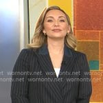 Kelly O’Grady’s navy pinstripe suit with denim trims on CBS Mornings Kelly O’Grady’s navy pinstripe suit with denim trims on CBS Mornings